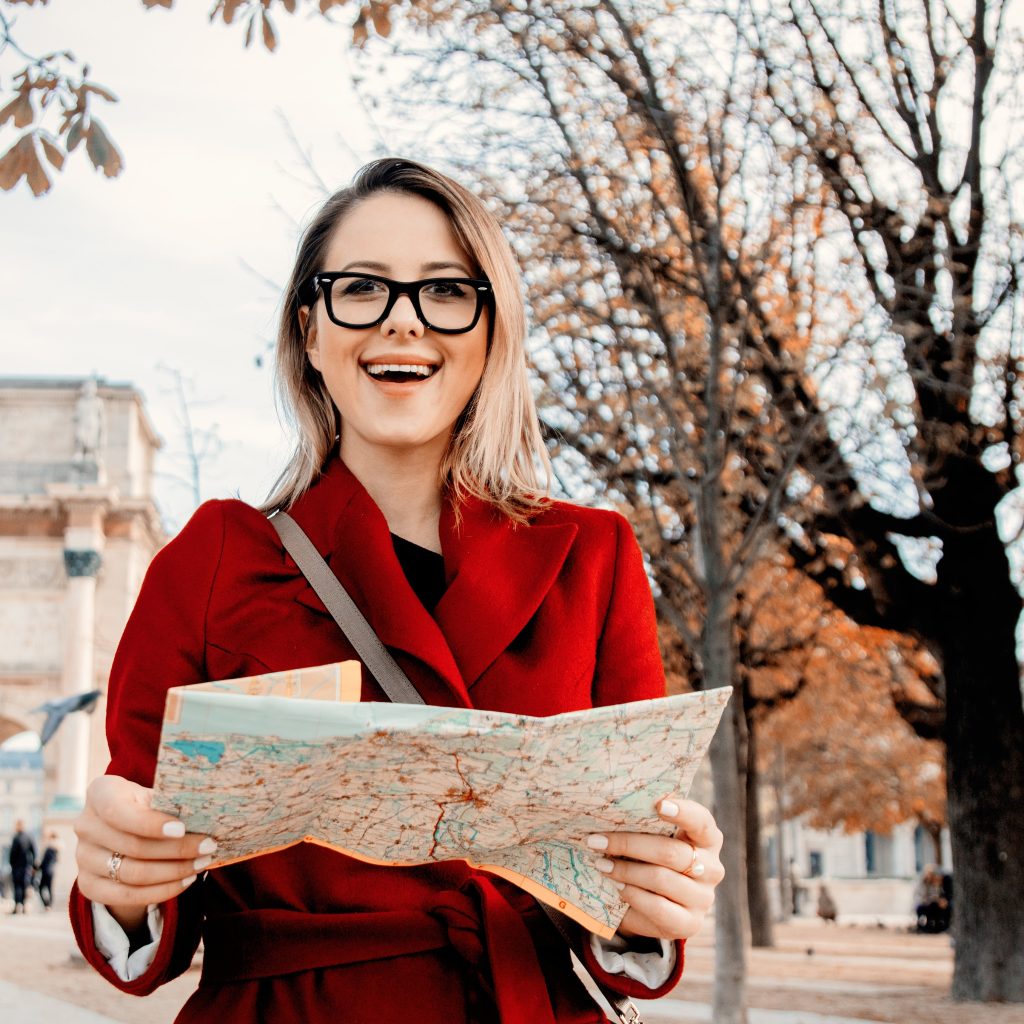 woman reading map in Paris